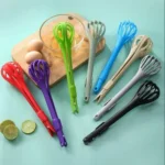 Plastic Egg Tong | Plastic Egg Tong Price in Pakistan | Tong | Multipurpose Tong | 2 in 1 Whisk and Tong | Egg Holder | Noodles Holder